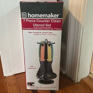 New in box 7 piece utensil set with counter stand